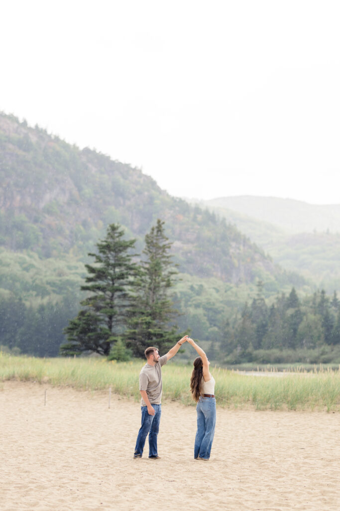 Acadia National Park Maine with the couple twirling